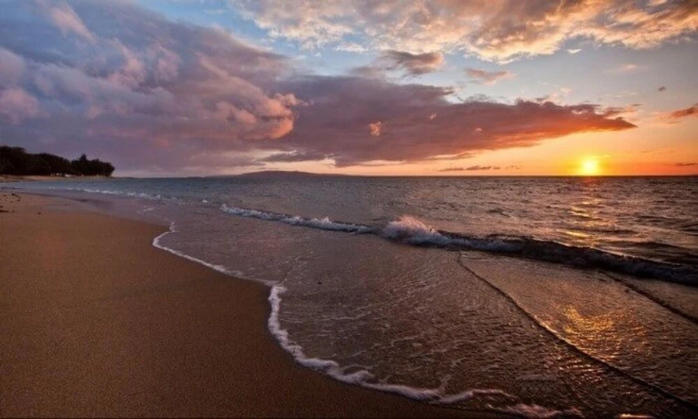 Atardecer en la playa de An Bang - atrae muchos los turistas cada día